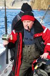 Old mariner Nikolay is smoking his pipe - his secret fishing attractor tackle